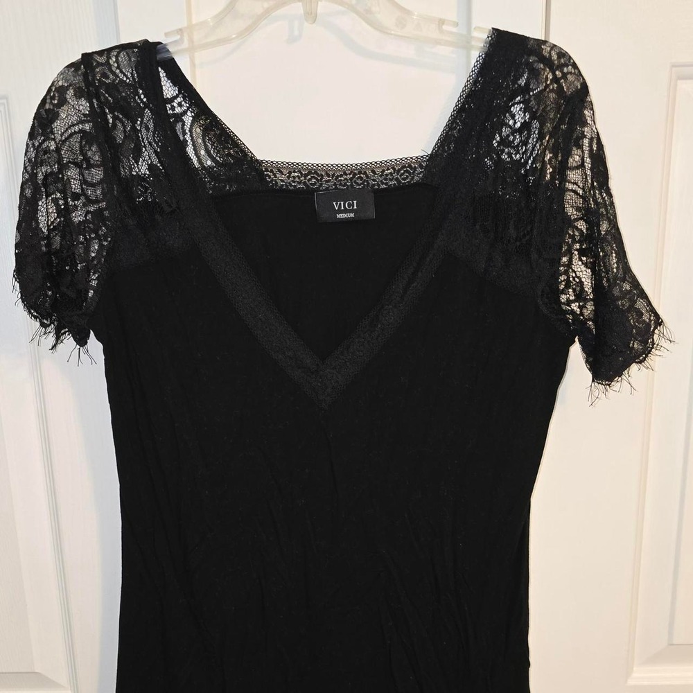 Vici black lace blouse with short sleeves and V-neckline, size M